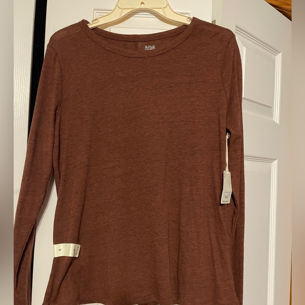 Women’s ANA brand, brand new long sleeve. Maroon size medium. New with tags.